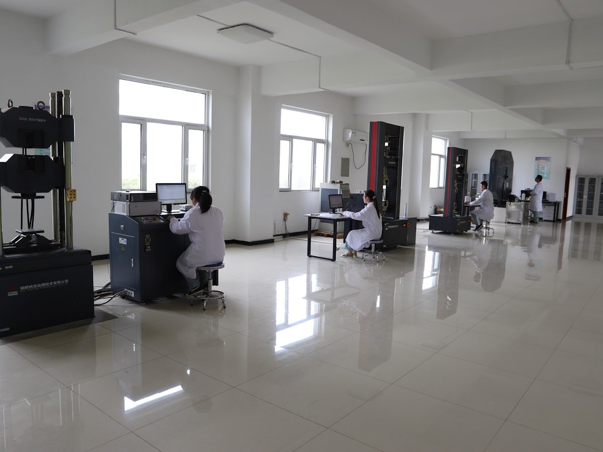 Quality control station reference photo — load test, brake test and folding cycle